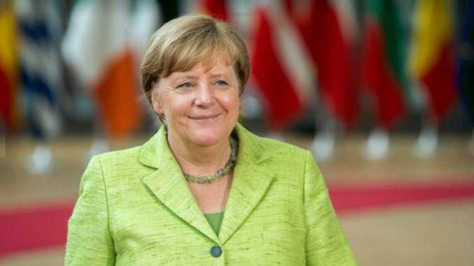 Angela Merkel riceve ad Assisi la lampada della pace