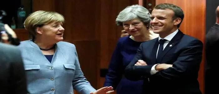 Merkel-Macron-May. I tre leader contro Trump: "Stop ai dazi o l'Europa si difenderà"