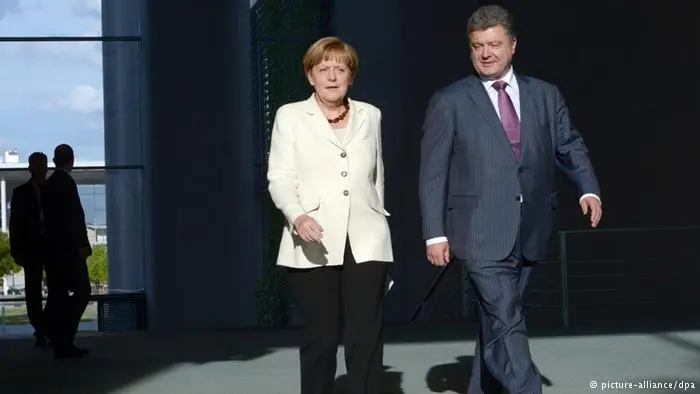 Ucraina: proseguono gli scontri a Donetsk. Incontro Merkel - Poroshenko a Kiev