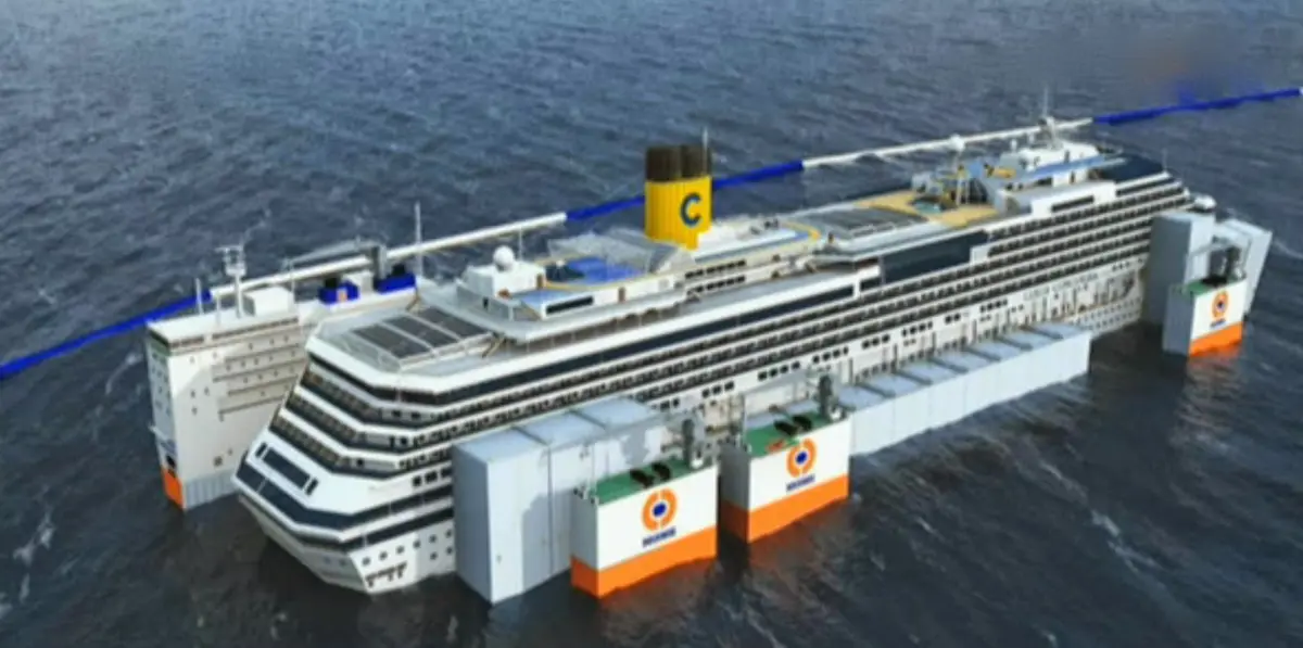 Costa Concordia arrivata a Genova all'alba: il vento rallenta l'ingresso nel porto