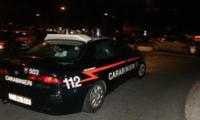 Scene da film durante la notte a Cagliari: spari, inseguimento e arresto