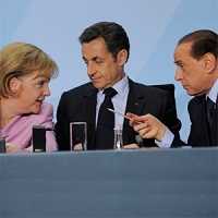 Berlusconi: "Merkel si è scusata". Lei smentisce. Sarkozy lo ignora