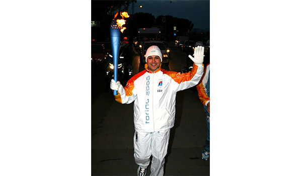 Calì per la seconda volta tedoforo alle Olimpiadi. Tappa a Grosseto nel 2005, a Siena nel 2025. 