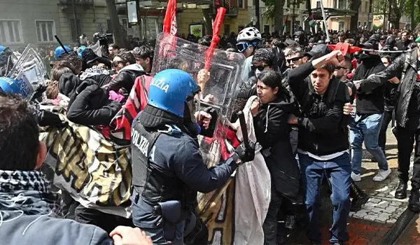 Scontri a Torino durante il Primo Maggio: tensioni davanti all’ex Askatasuna tra manifestanti e polizia