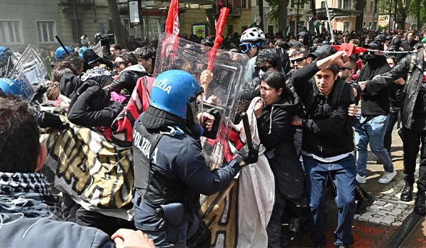 Scontri a Torino durante il Primo Maggio: tensioni davanti all’ex Askatasuna tra manifestanti e polizia